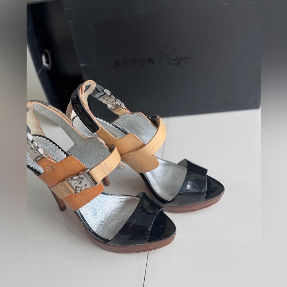 Report Signature Black and Tan Strappy Heels